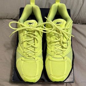 Women REEBOK Neon tennis shoes. Mint condition. Worn ONE time. No refunds